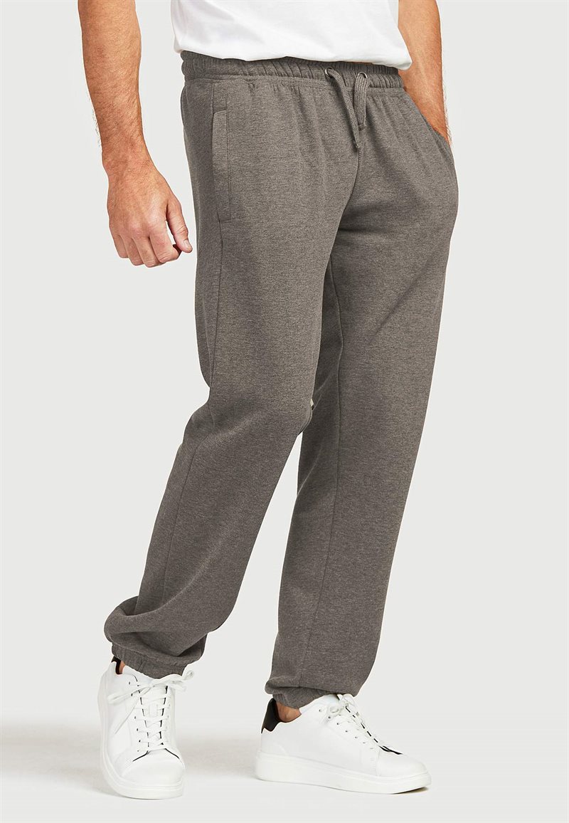 Joggingbukser med elastik på benafslutningerne