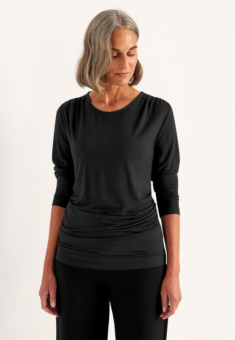 Top Premium i modal med rynkedetaljer