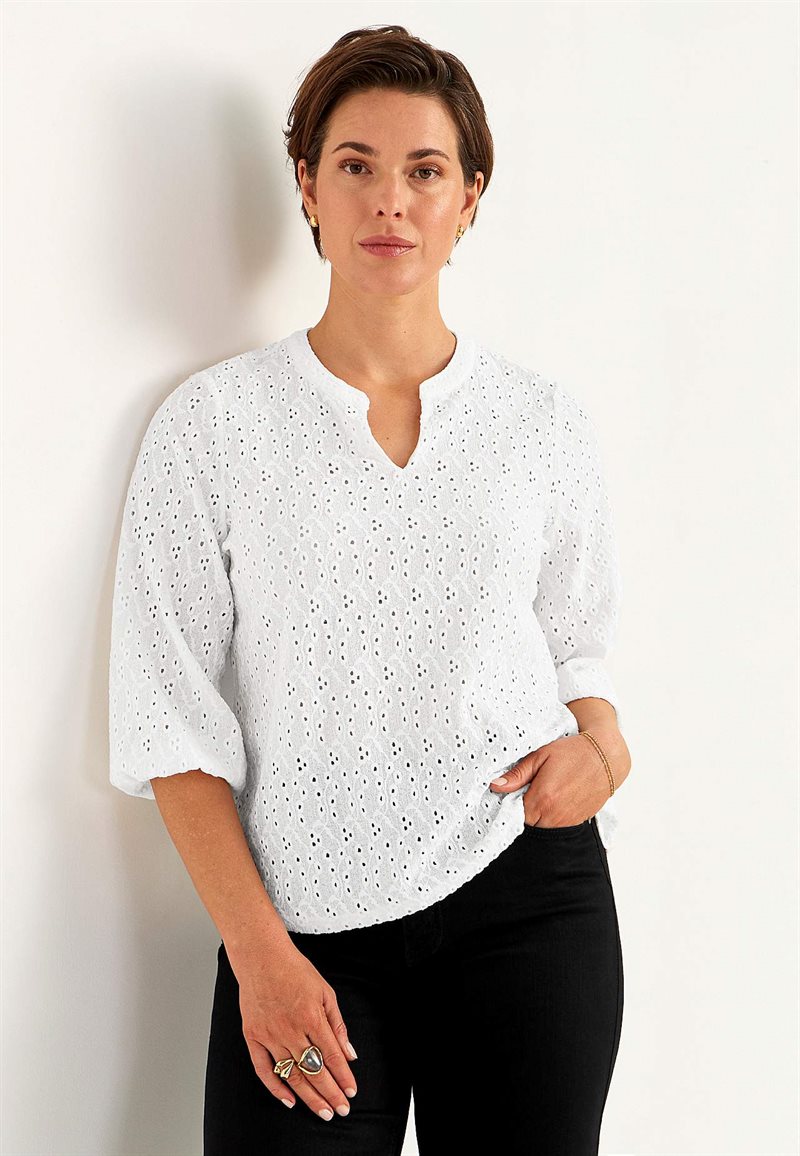 Jerseytop med broderet hulmønster