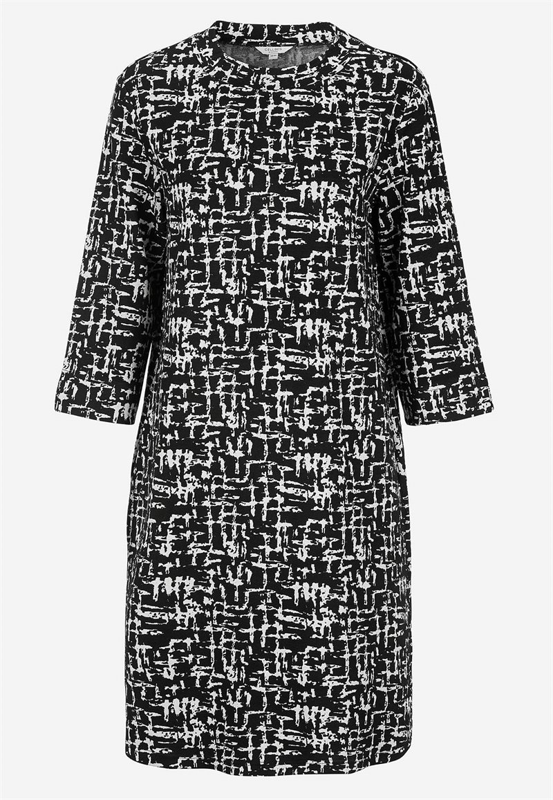 Mønstret kjole med sidelommer