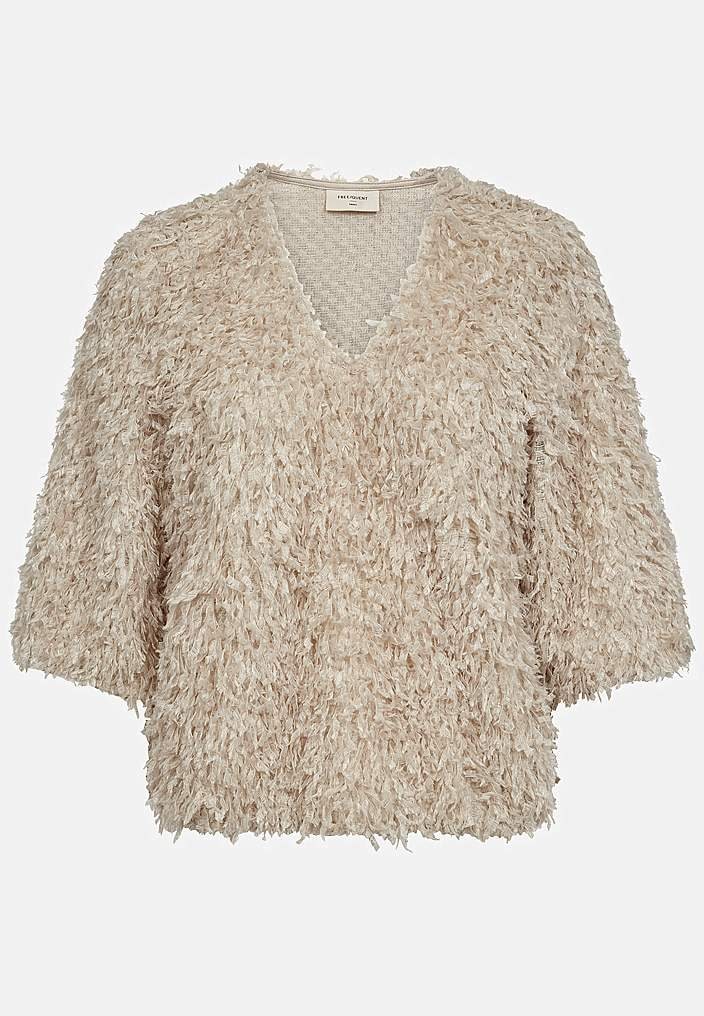 Festtop med fjerlignende materiale