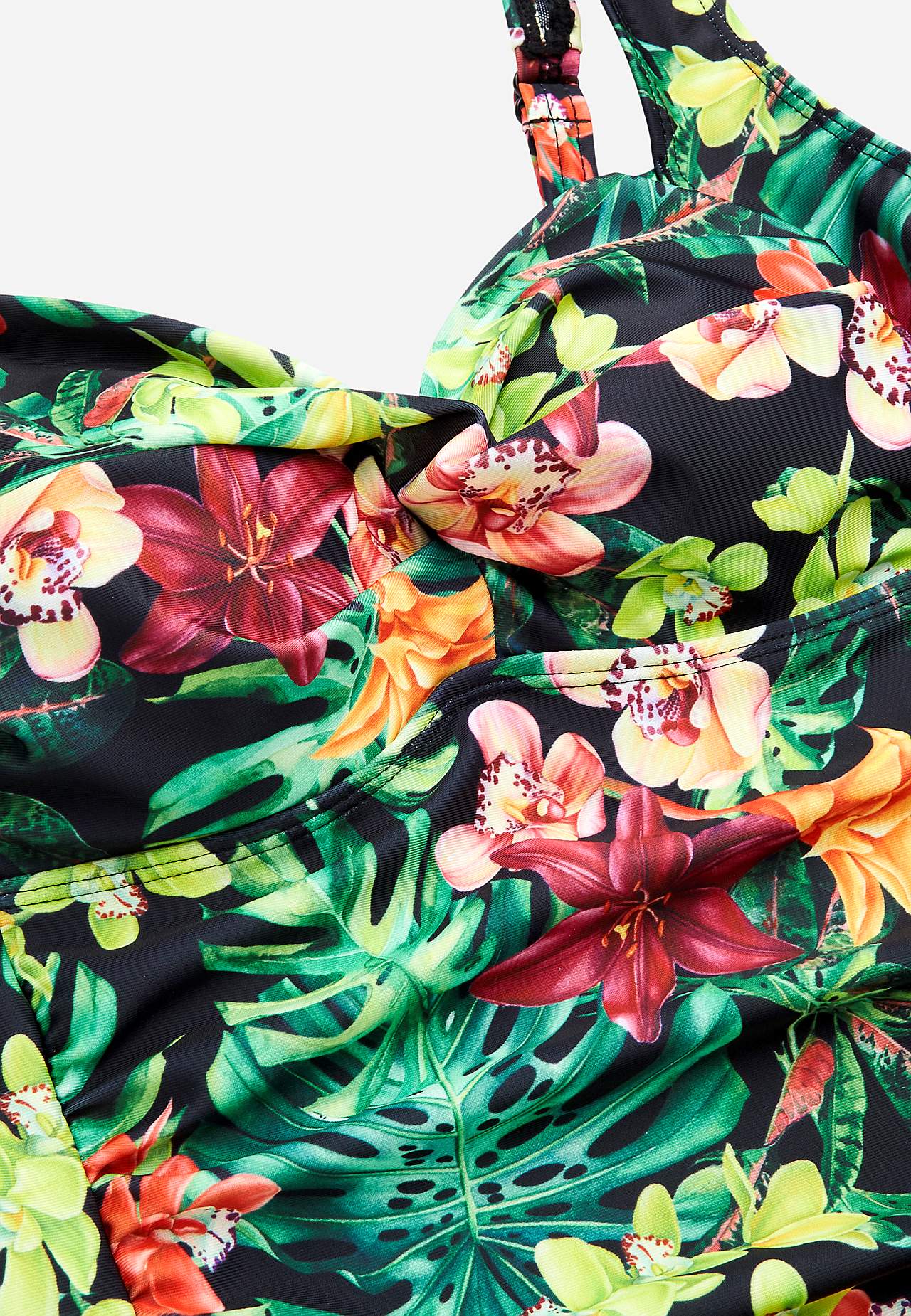 Tankinitop med shaping-effekt og et blomstermønster