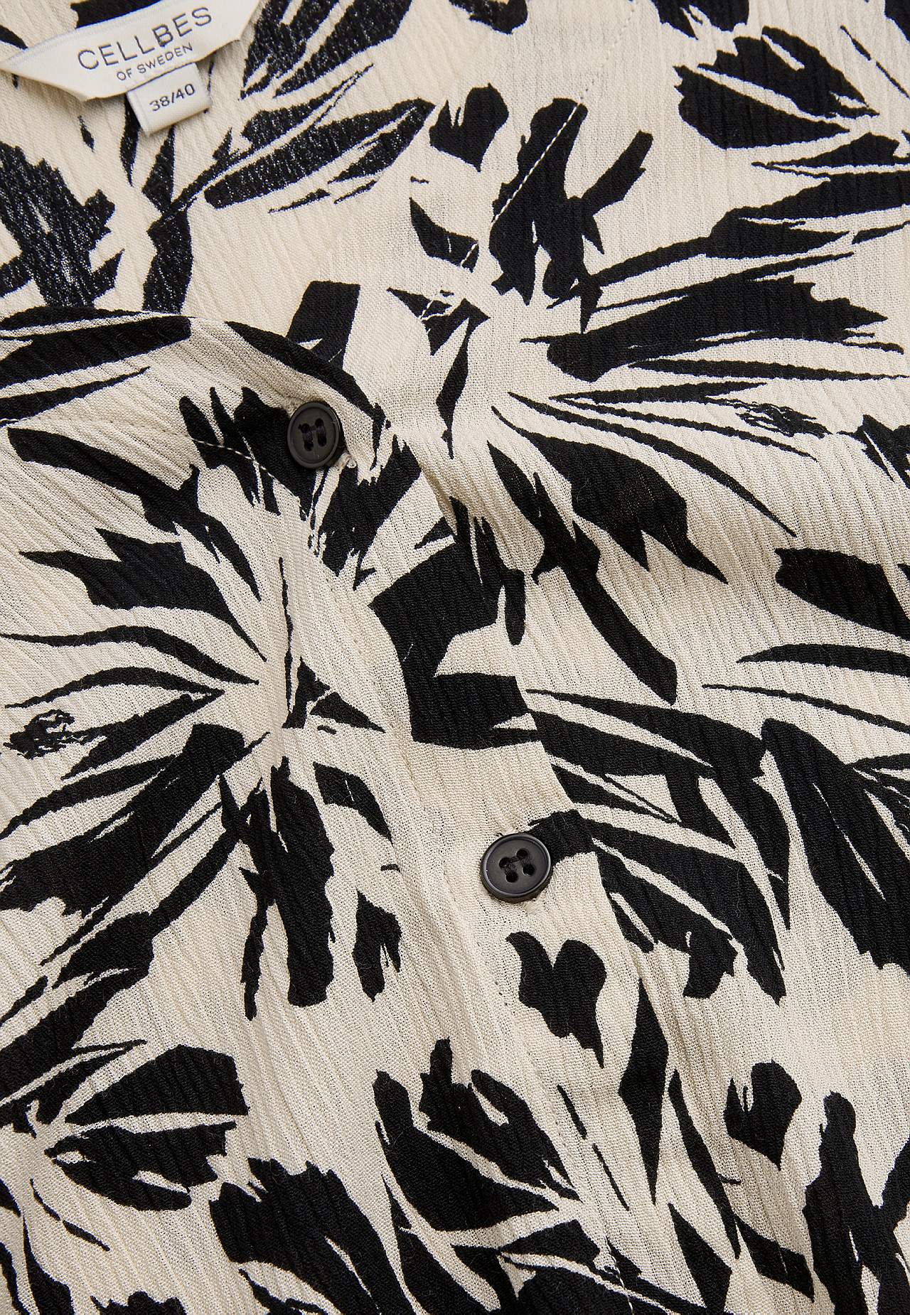 Bluse med crepe kvalitet