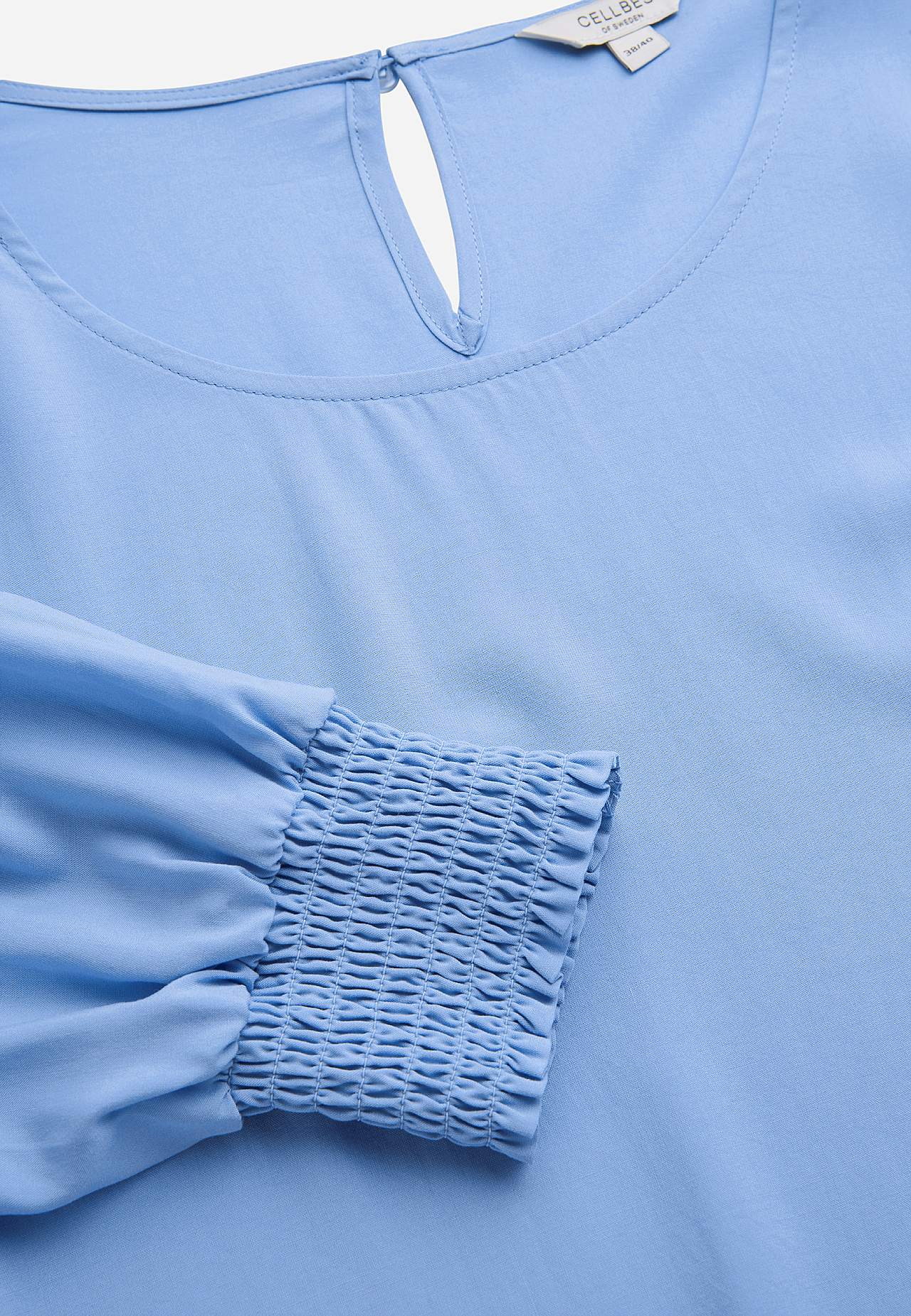 Bluse med smock ved manchetterne
