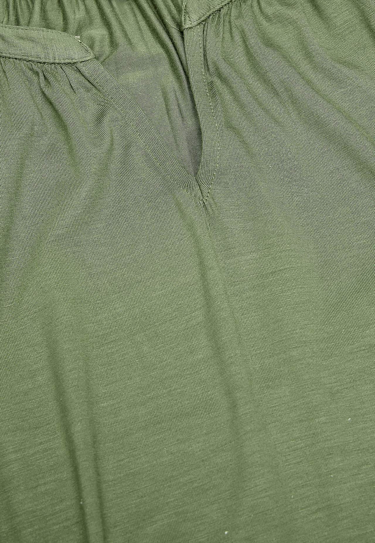 V-udskåret jerseytunika