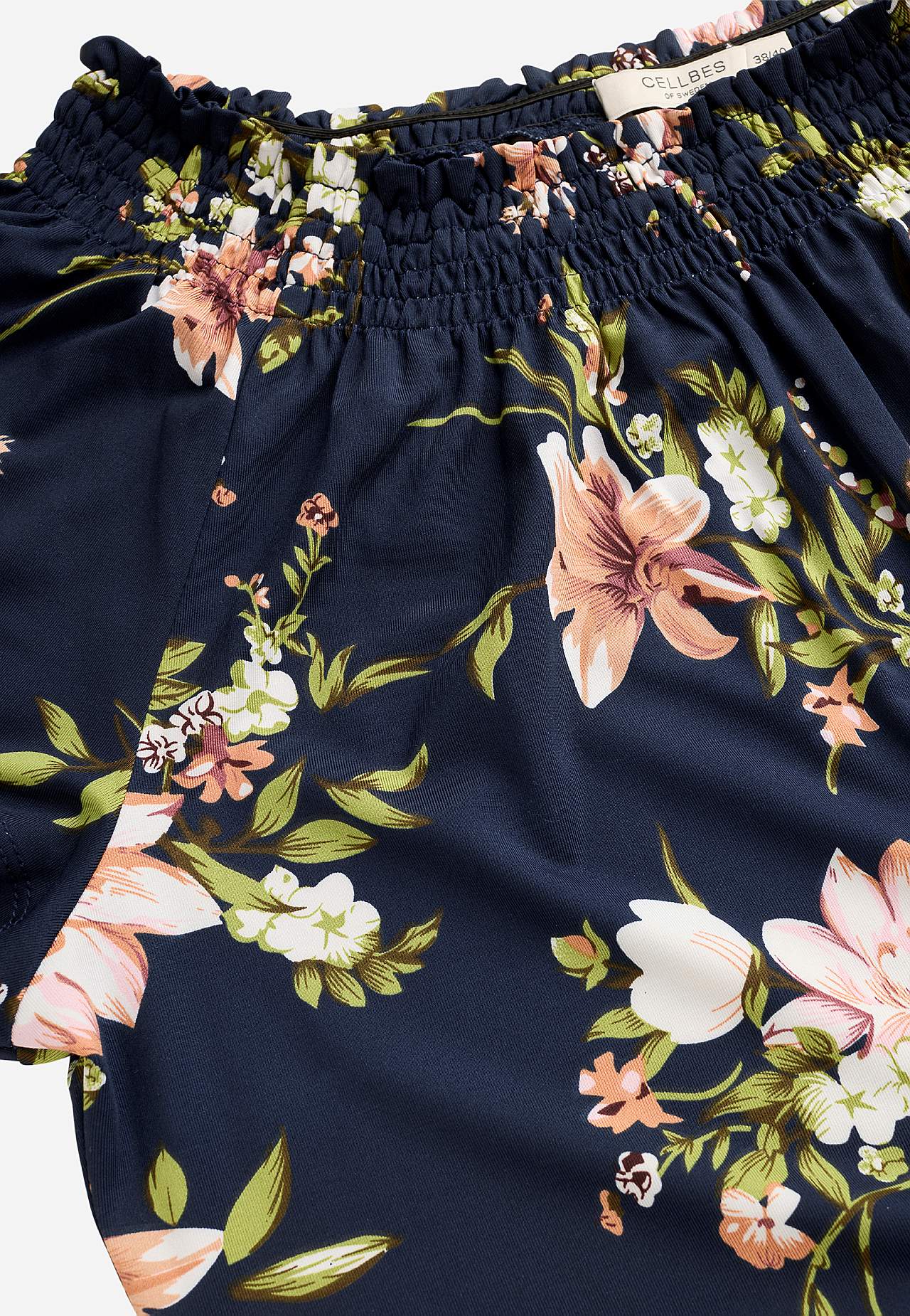 Jerseykjole med et blomstermønster