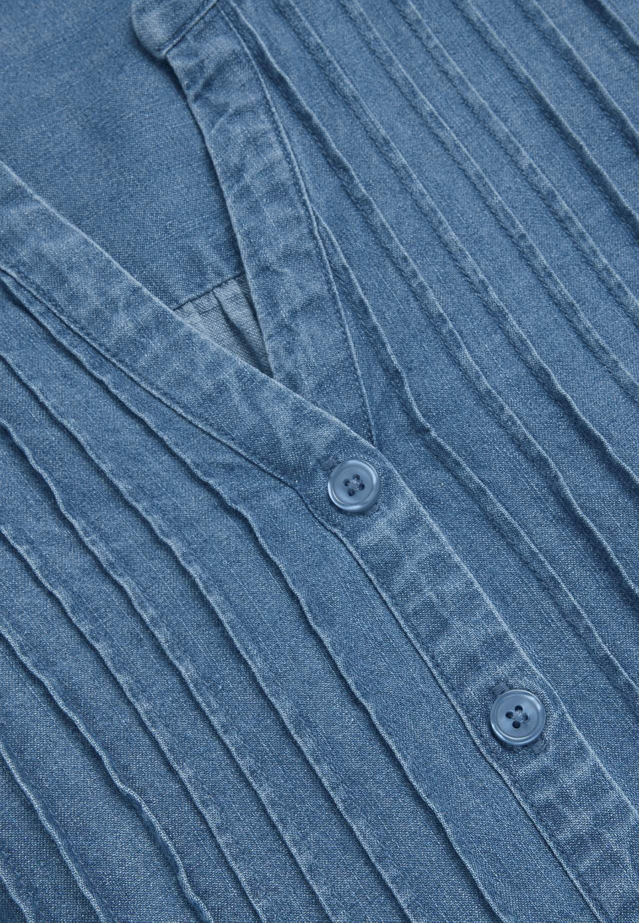 Luftig tunika i let denim med lommer