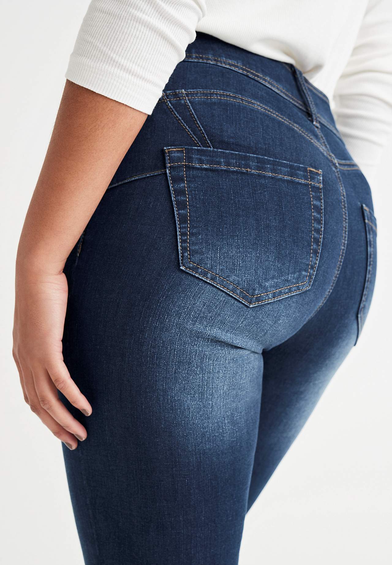 Shaping-jeans med bootcut og superstræk