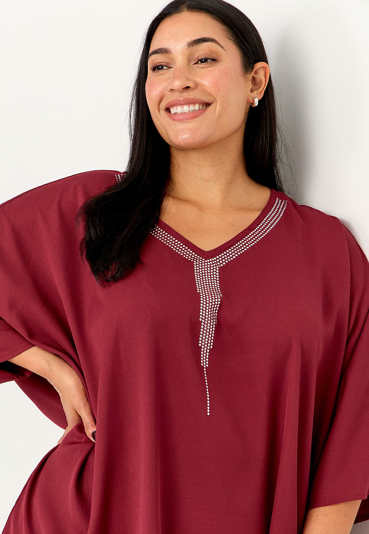 Festbluse med nittedetaljer