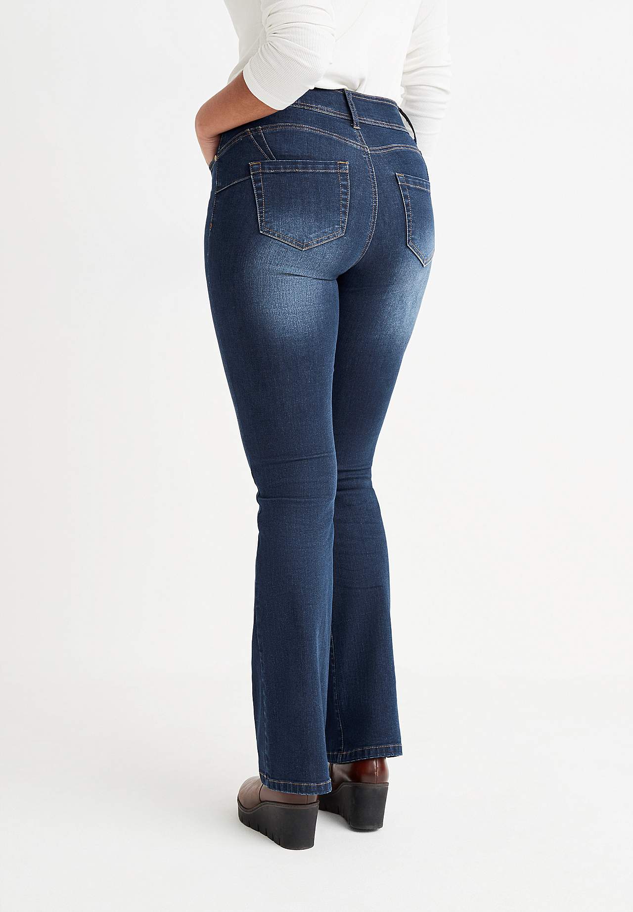 Shaping-jeans med bootcut og superstræk