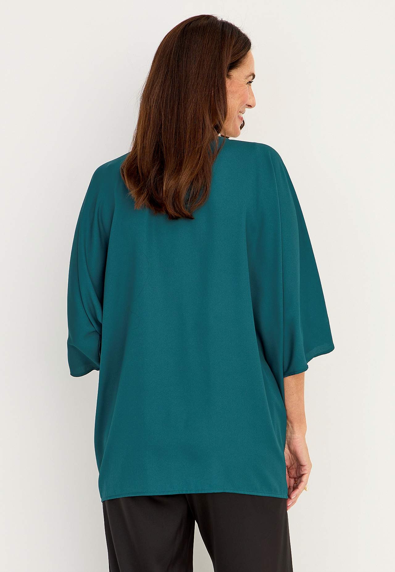 Festbluse med nittedetaljer