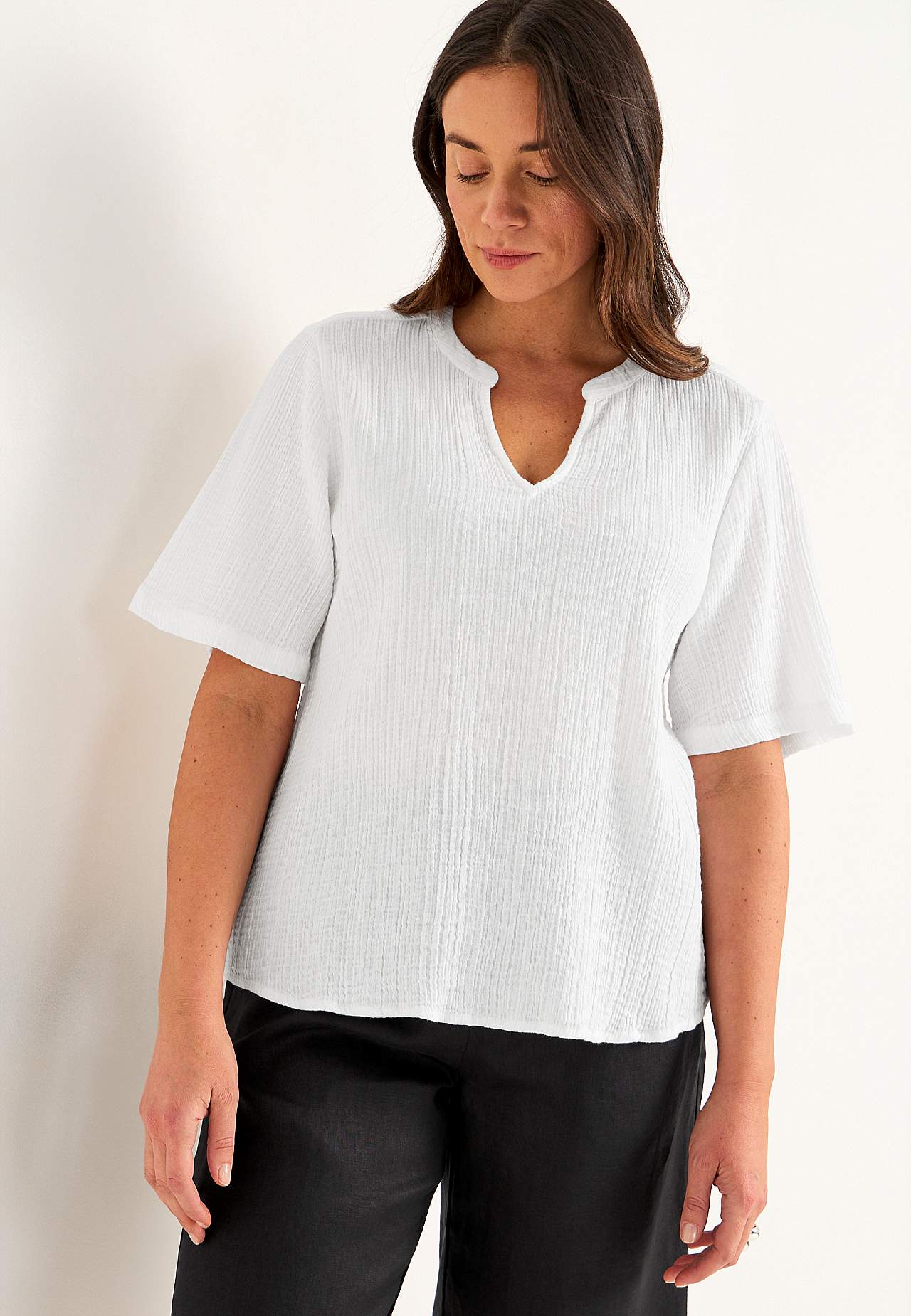 Bluse i rynket bomuld