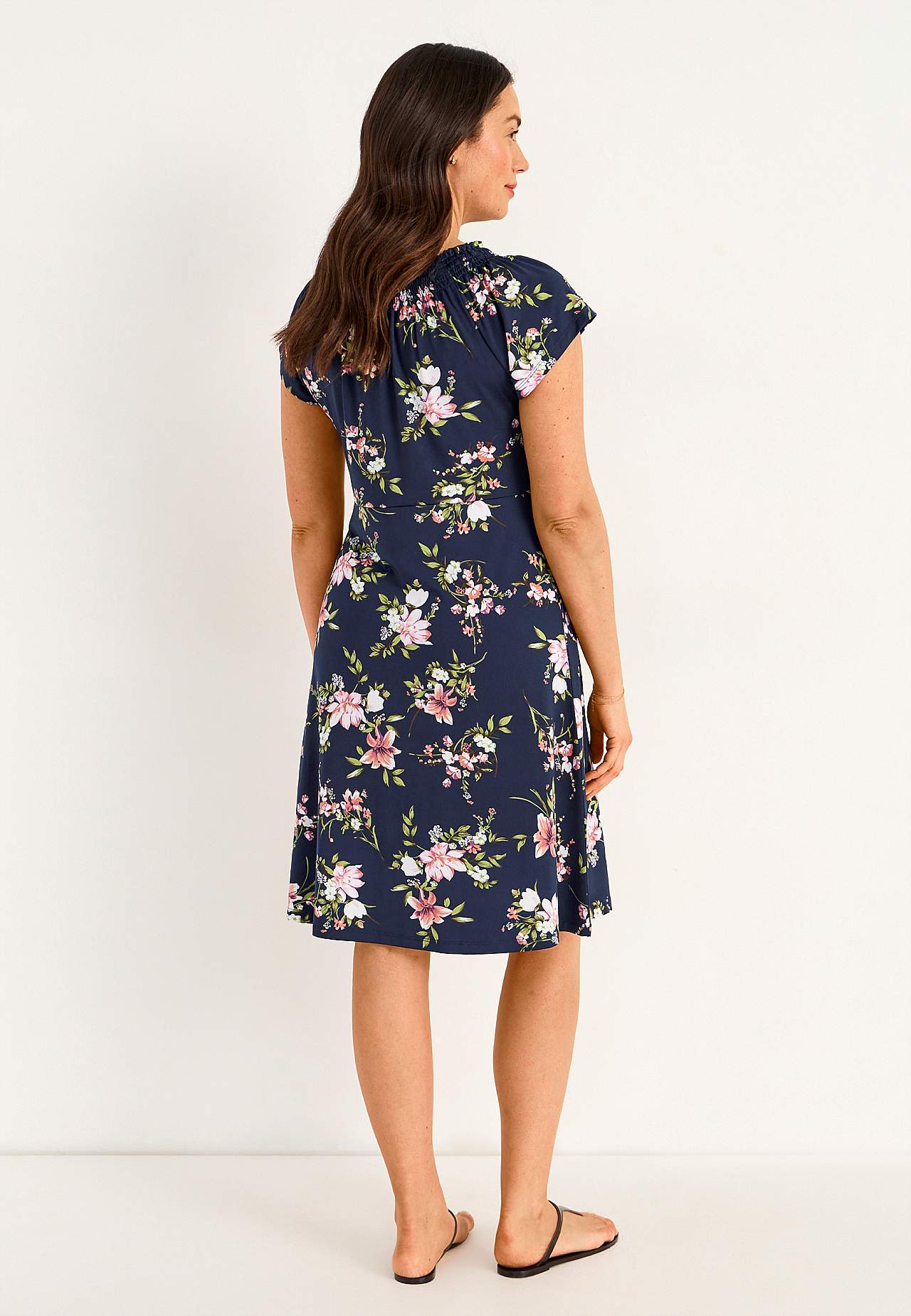 Jerseykjole med et blomstermønster