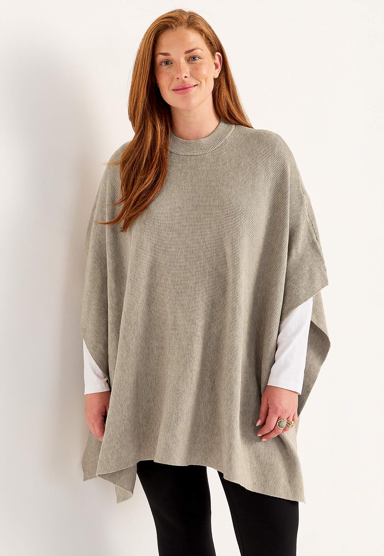 Fintstrikket poncho