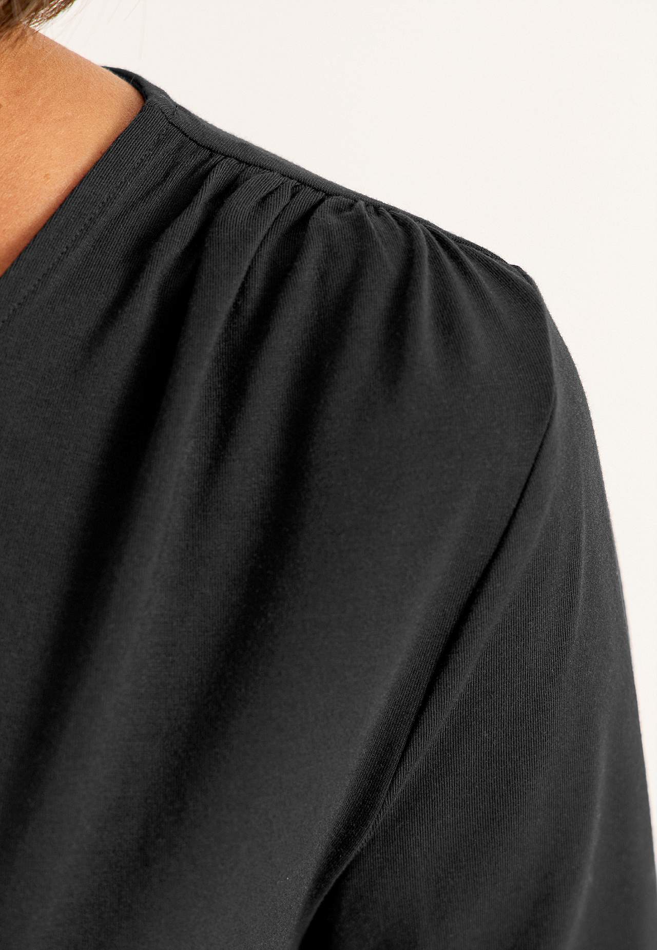 Top Premium i modal med rynkedetaljer