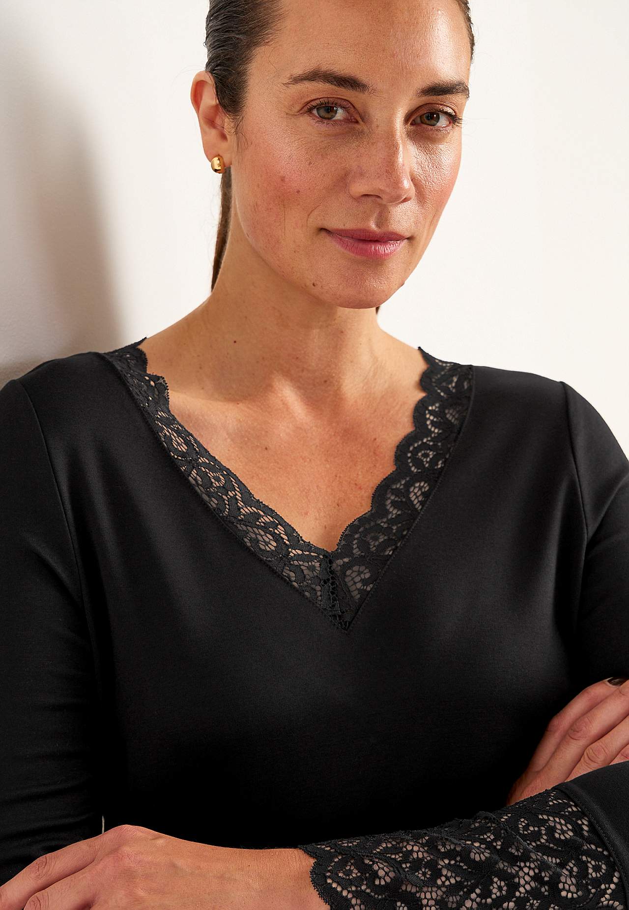 Jerseytunika med blondedetaljer