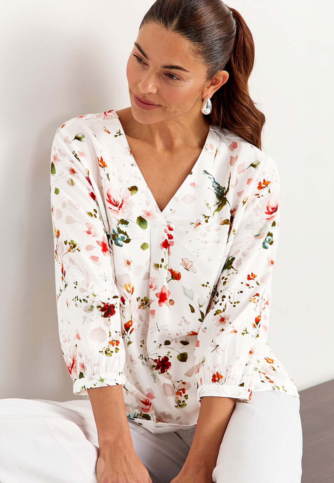 Vævet bluse med et blomstermønster