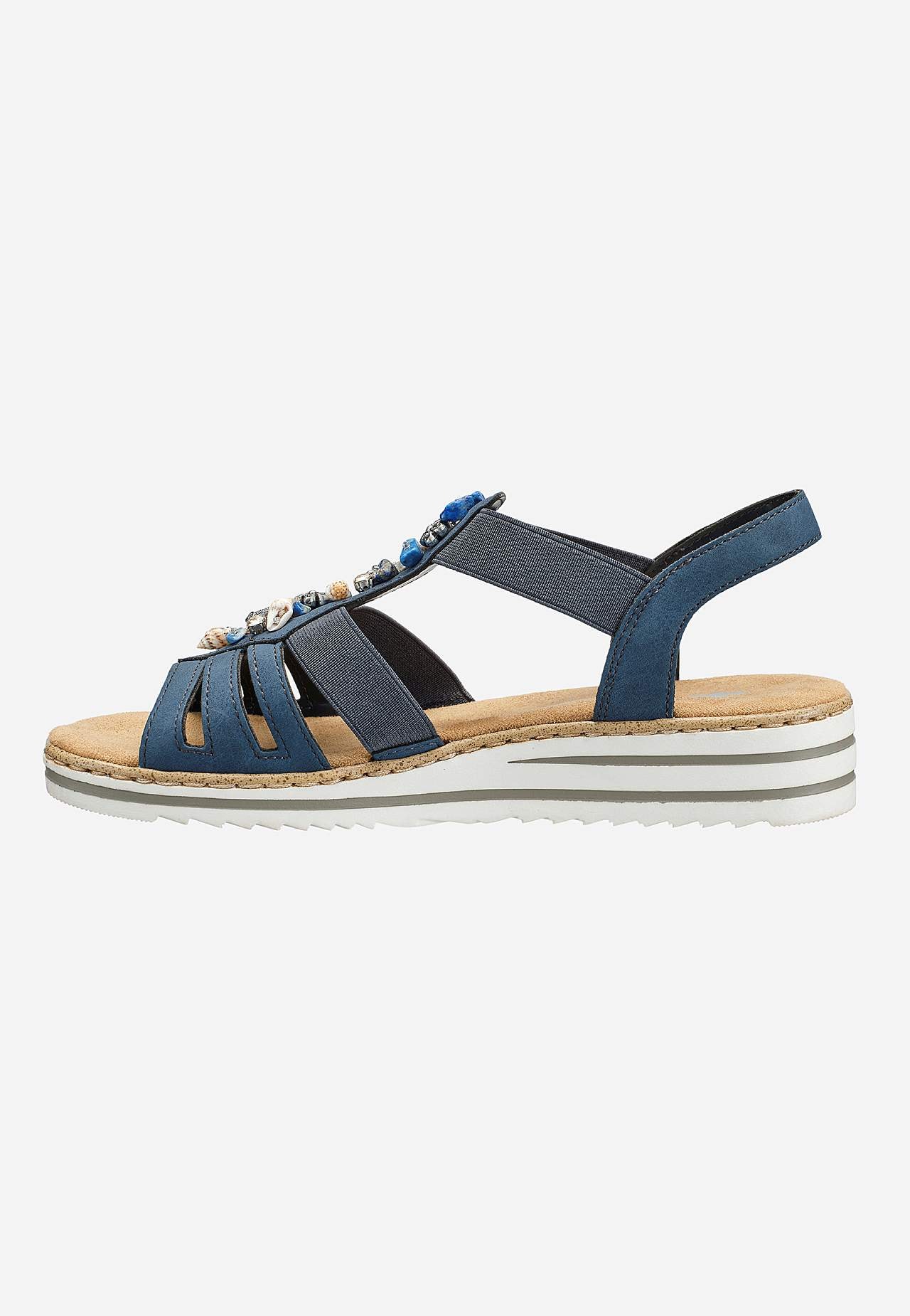 Sandal med dekorative skaller og sten