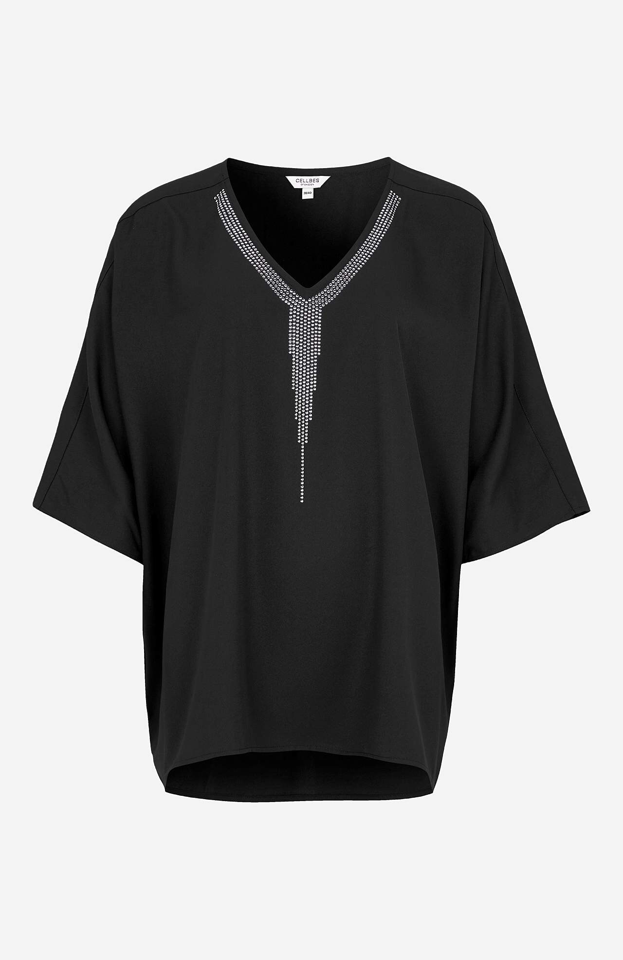 Festbluse med nittedetaljer