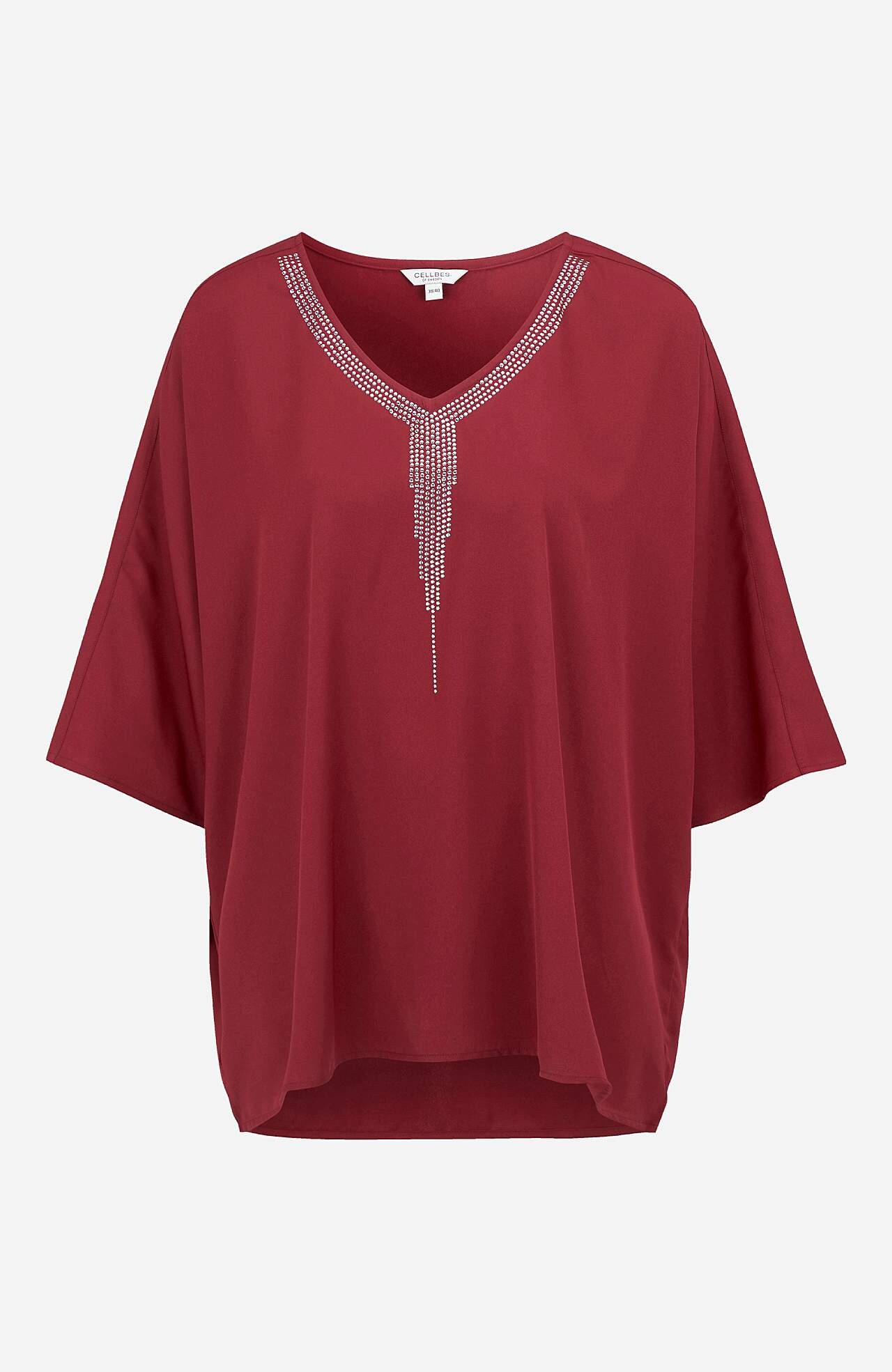 Festbluse med nittedetaljer