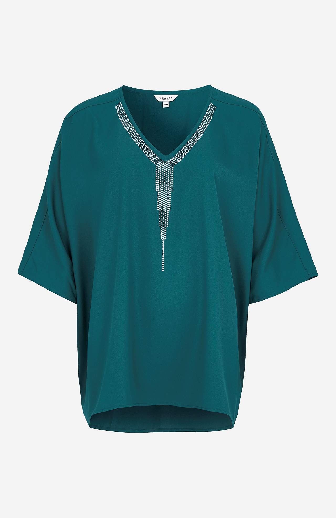 Festbluse med nittedetaljer