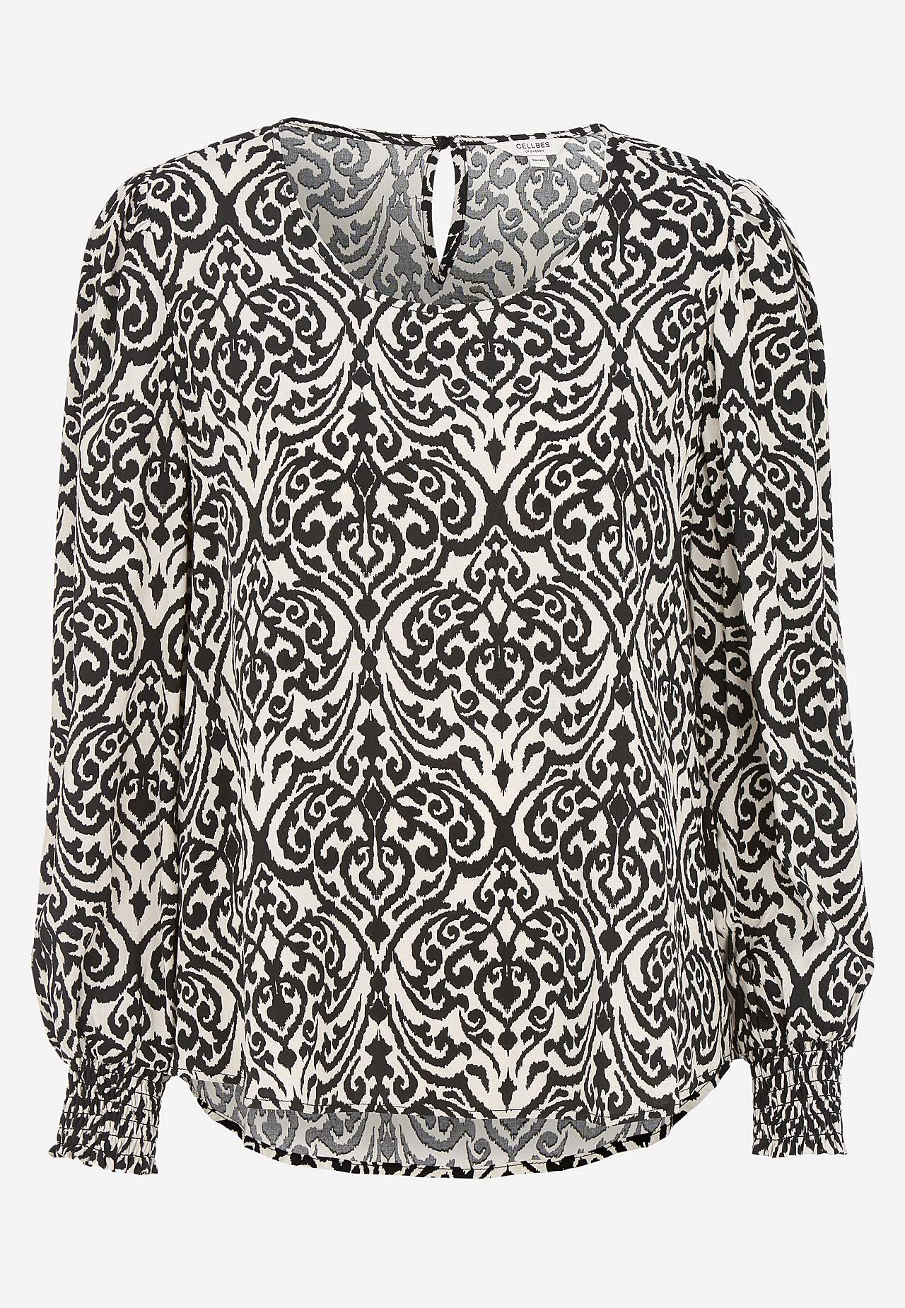 Bluse med smock ved manchetterne