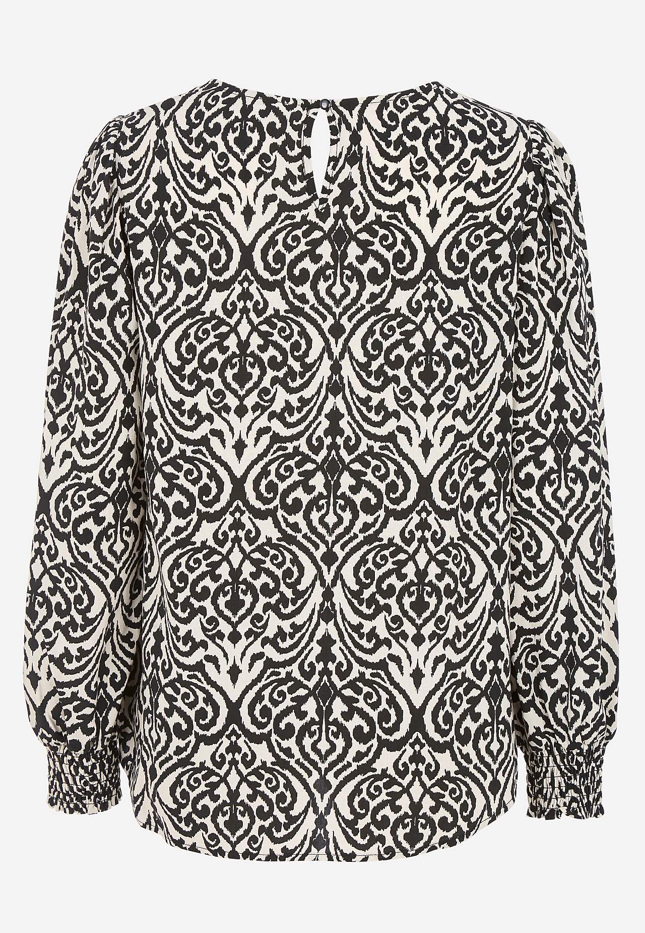 Bluse med smock ved manchetterne