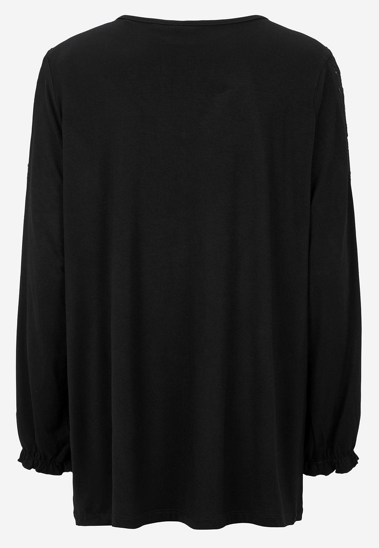 Jerseytop med blondedetaljer på ærmerne