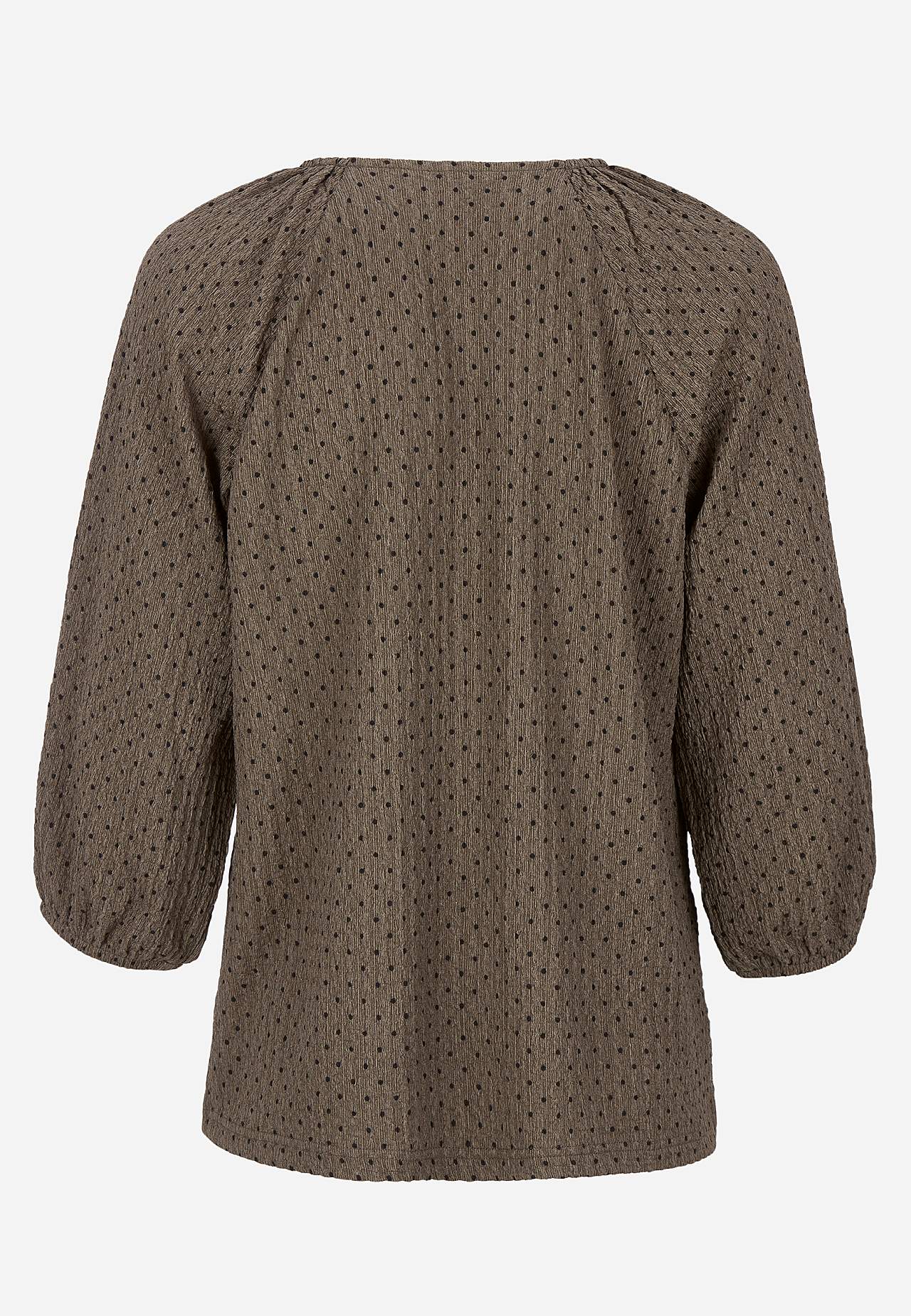 Prikket top med elastisk crepe kvalitet
