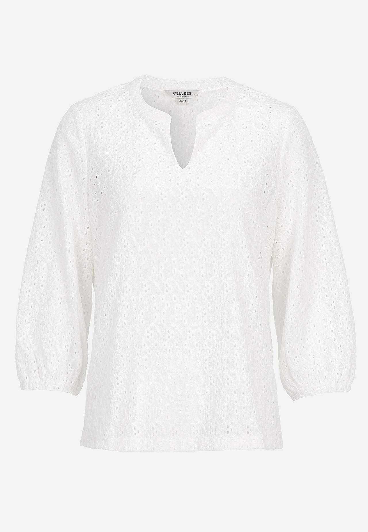 Jerseytop med broderet hulmønster