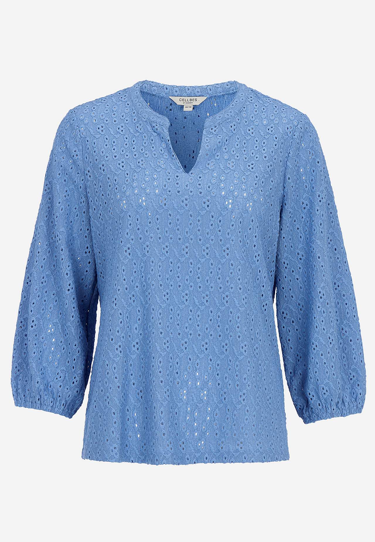 Jerseytop med broderet hulmønster