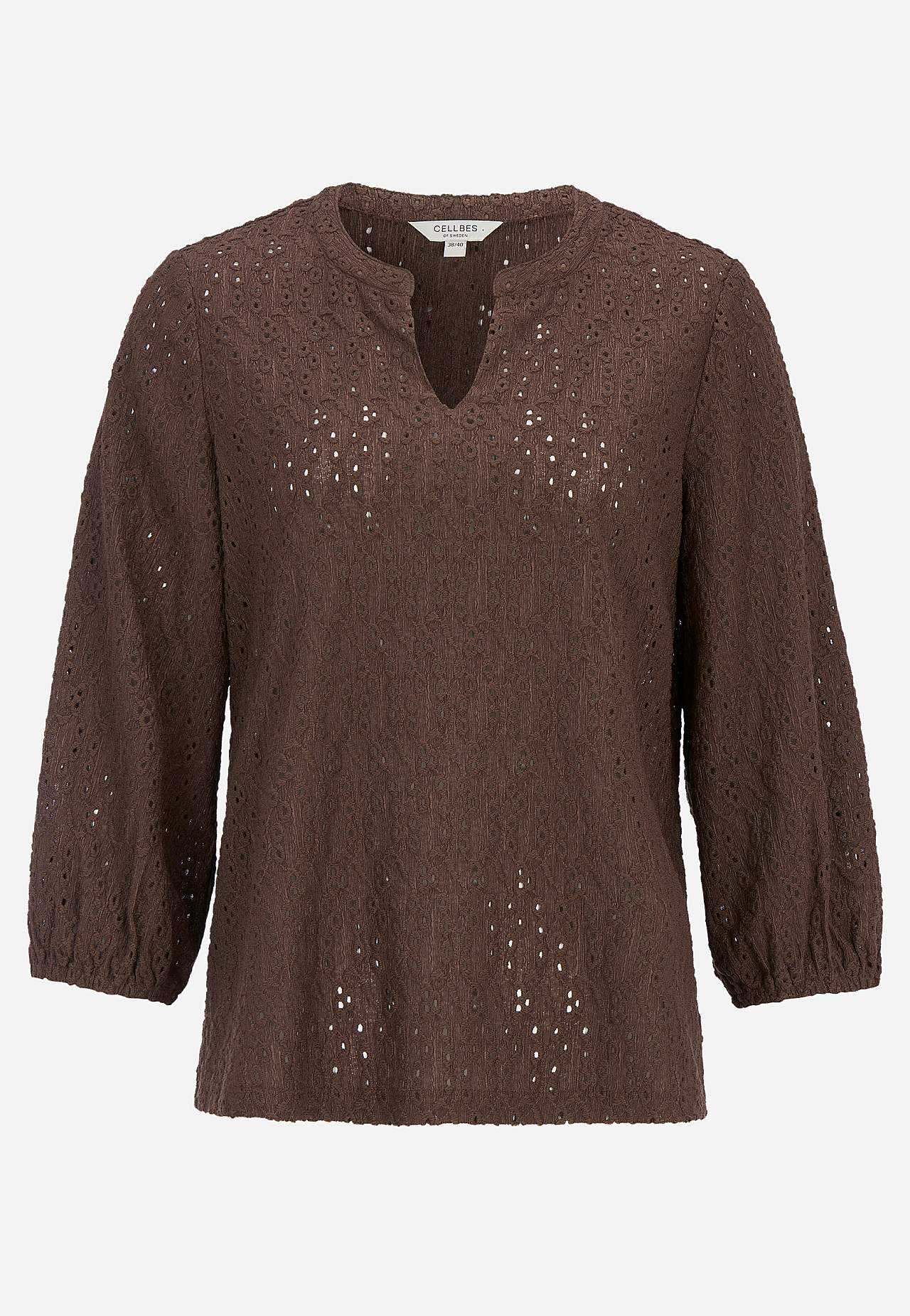 Jerseytop med broderet hulmønster