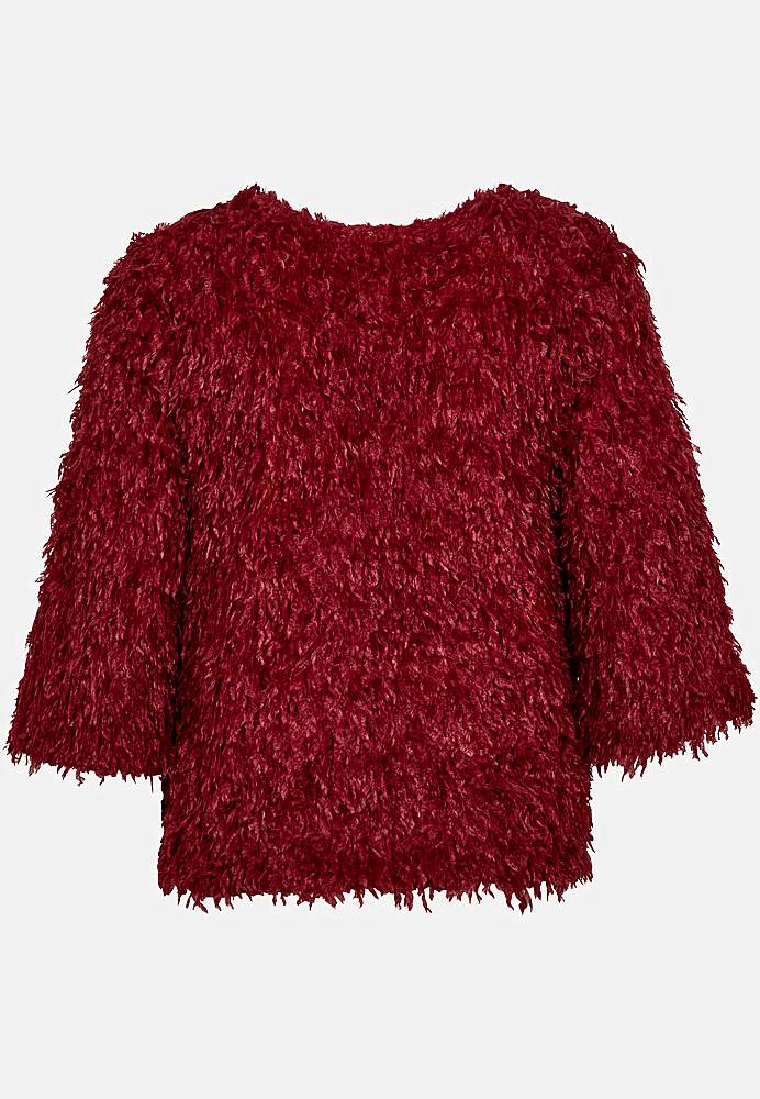 Festtop med fjerlignende materiale