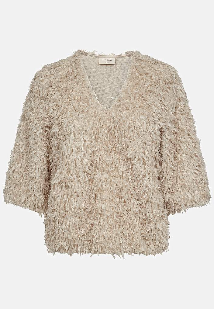 Festtop med fjerlignende materiale